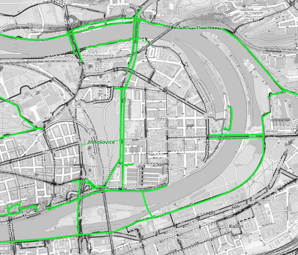 Schéma cyklistických propojení bez kontaktu s motorovou dopravou v oblasti Holešovic. Přerušovanými liniemi jsou naznačeny v blízké budoucnosti plánované stavby.